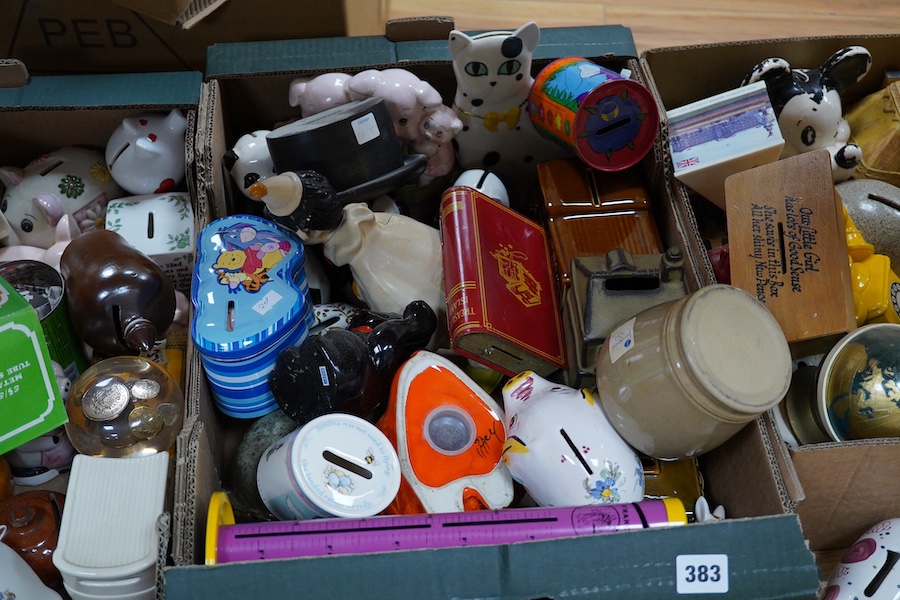 A large collection of mostly late 20th century pottery, metal and wooden novelty money boxes, including Rye, Staffordshire etc. (3 boxes). Condition - mostly fair to good.